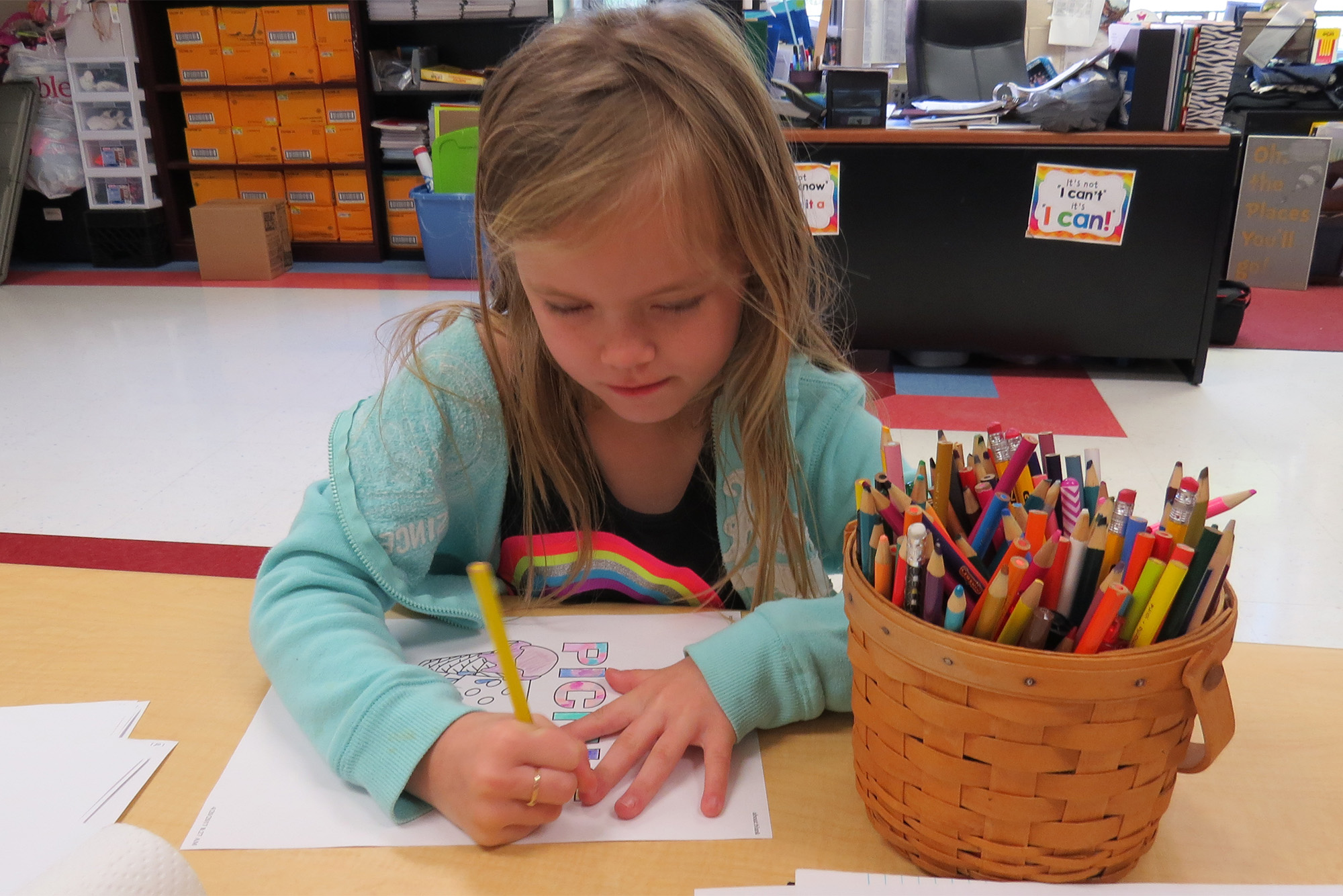 Girl in Kentucky coloring with sponsor gifts